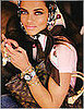 The iPhone in a Chic Peach Case With Charms