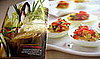 Photographs of selected recipes are in the front of the cookbook.