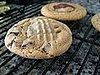 Peanut butter chocolate chip cookies with a hidden pb cup surprise!