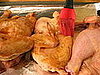 Brush the hens on both sides with the glaze before baking.