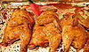 Glaze the hens twice more during baking (see instructions).