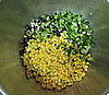 Mixing the corn black bean salad.