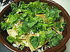 Topping with lettuce and cilantro. 