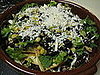 Topping with more cheese