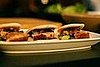 Rocco and I chatted while noshing on David Chang's pork buns.