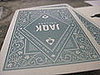 The playing cards out of their deck. 
