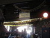 The bar is decorated with anniversary signs. 