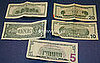 The backs of the bills are distinctly different from one another, with the twenty and ten resembling each other most. 