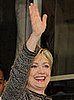 New Secretary of State Hillary Clinton gets big cheers during first day on the job.