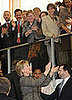New Secretary of State Hillary Clinton gets big cheers during first day on the job.