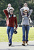 Marcia Cross and her husband, Tom Mahoney took their twins, Savannah and Eden on shoulder rides through the park.