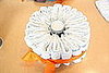 A cup in the center can help you shape the circle and fill out the edges. 