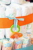 Add pacifiers, onesies, aspirators and the like for extra decoration.