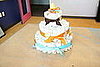 Place the cake (ideally on a cake platter) on one yard of tulle.
