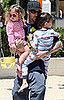 Travis Barker toted his tots around the playground.