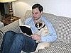Wellie getting read to by his daddy.