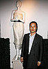 Designer Philip Lim poses by his wedding dress 