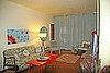 Living Room: View 3. Rug, drapery and art by your truly