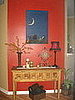 The other wall. My Dad painted that painting with the moon.