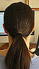 Create a low ponytail.