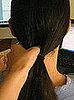 Use your fingers to separate hair above ponytail holder, creating a hole.