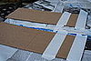 Next, create the wings for your plane.  Place strips of tape on the two longer flaps that were cut off of the plane in the first