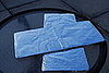 Cover the smaller flaps with aluminum foil.  Using the stapler, attach the two flaps together in an "X" formation.