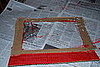 Paint the "windshield" the same color as the racing stripes and attach a piece of plastic wrap to the inside of the boarder.