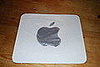 Once the paint has dried, cover the square with plastic wrap to simulate the iPod screen.