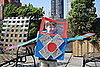Have you child place his arms through the arm-holes to move the plane wings as he flies down the street.