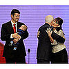 McCain Hugs Palin as Her Hubby Watches