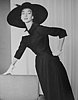 Dorian Leigh, for Elle collections Haute Couture, photograph by George Dambier, 1955.