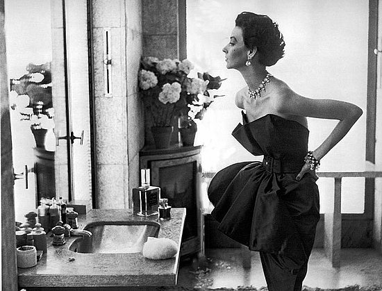 Dorian Leigh, dress by Piguet, photograph by Richard Avedon, Helena Rubenstein's apartment,
Paris, 1949.