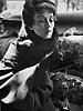 Dorian Leigh, Dior coat, photograph by Richard Avedon, Paris, 1949.