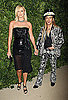 Charlize Theron and John Galliano
