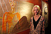 Feb 8: With her artwork at her "I Spy" exhibition.