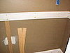 here's the middle stage...hanging the wainscoting
