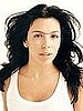 Eva has olive skin and her hair accents her dark eyes and flawless skin. She looks pretty amazing with out tons of makeup, dont 