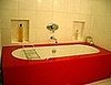 We found this a-mazing Boffi Makro Cherry Red Glass bath tub. It is a full 6 feet long. Perfect bath size!