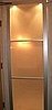 This is a picture of the entry door to the bath. When the translucent glass door is closed, a light goes on. 