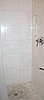 We put Carrara Marble tiles in the floor of the Thassos White Marble shower stall.