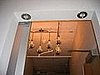 We placed halogen spot lamps from IKEA inside the threshold. In the background is our IKEA DIY chandelier project.