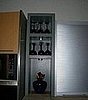 We placed this shelving unit from Bulthaup next to the sink and storage unit.