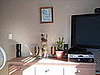 the dresser in front of our bed...I love nik naks i got on here.  Very relaxing :)

Then we have that big 42" TV on the wall s