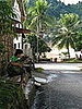 Boy Playing Guitar Near the Mekong River