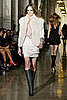 This fur vest paired with petal pleat skirt is too luxe
