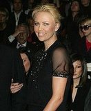 Photo: Charlize Steps Out and Takes Off With Stuart 