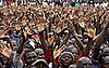 Zimbabaweans greet their new Prime Minister.