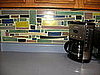Backsplash and coffee maker