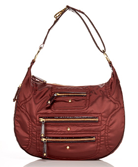 Guess Who Designed This Sporty Burgundy Bag?